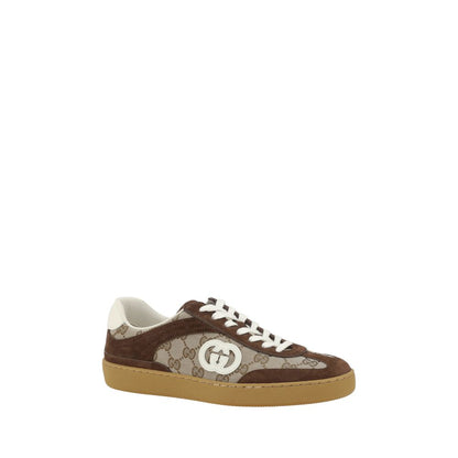 Gucci Brown Calf Leather Bos Taurus Low Top Sneakers with suede details and iconic GG fabric, featuring lace-up closure and flat sole.