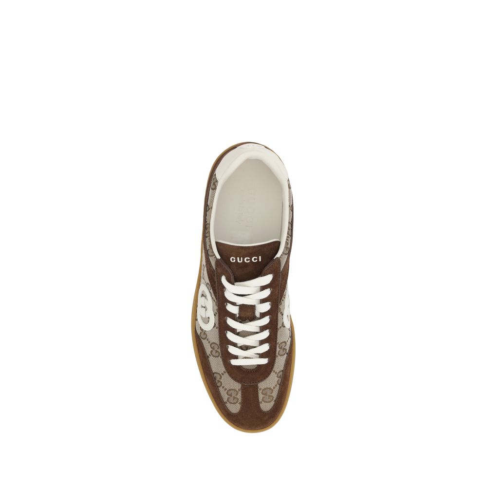 Gucci Brown Calf Leather Bos Taurus Low Top Sneakers with GG fabric and suede details, featuring a lace-up front and round toe design.