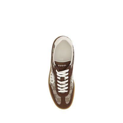 Gucci Brown Calf Leather Bos Taurus Low Top Sneakers with GG fabric and suede details, featuring a lace-up front and round toe design.