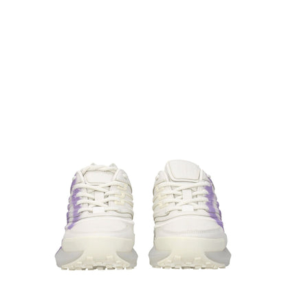 Givenchy Beige Leather Low Top Sneakers with lilac detail, rubber sole, mid heels, lace-up closure, and logos on front and back view.