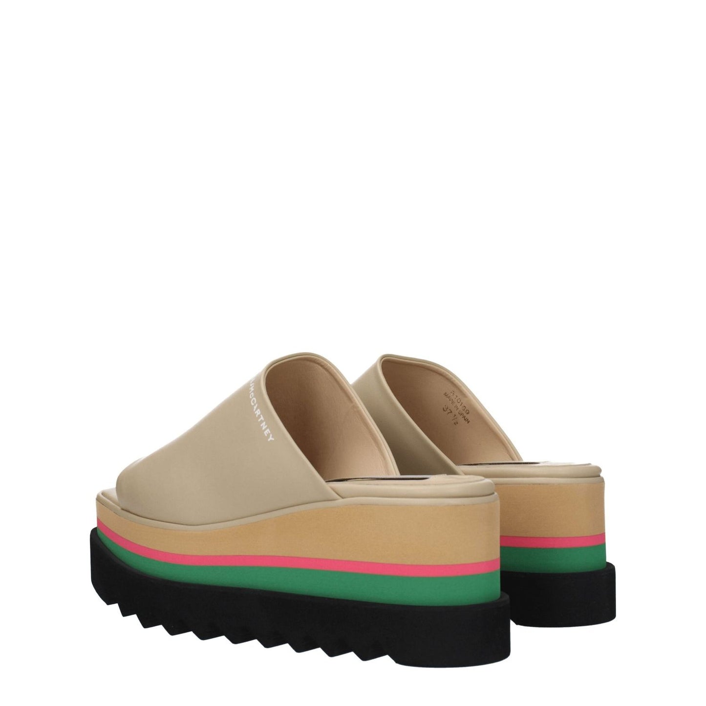 Stella McCartney Beige Leather Slippers with open toe, wedge heel, and rubber sole. Featuring side logo design in eco leather.