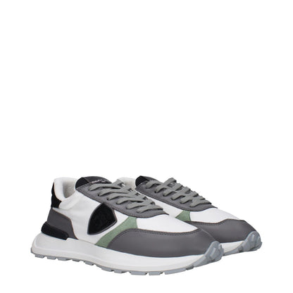 Philippe Model White Fabric Low Top Sneakers with front logo, back logo, and vintage effect.