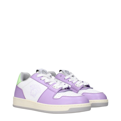 Alt Tag: Versace White Leather Low Top Sneakers with lilac accents, featuring logos on front, side, and back. Casual lace-up with rubber sole.