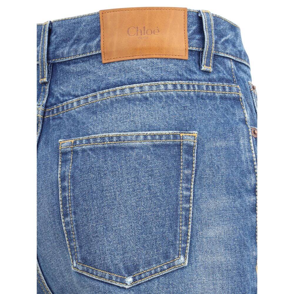 Chloé Blue Cotton Flared Jeans showcasing back pocket and brand label, highlighting classic design and contemporary style.