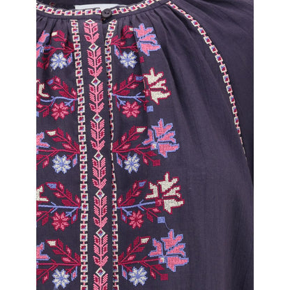 Embroidered detail of Marant Etoile Blue Cotton Blouse with cross-stitch patterns and concealed buttons for a boho-chic look.
