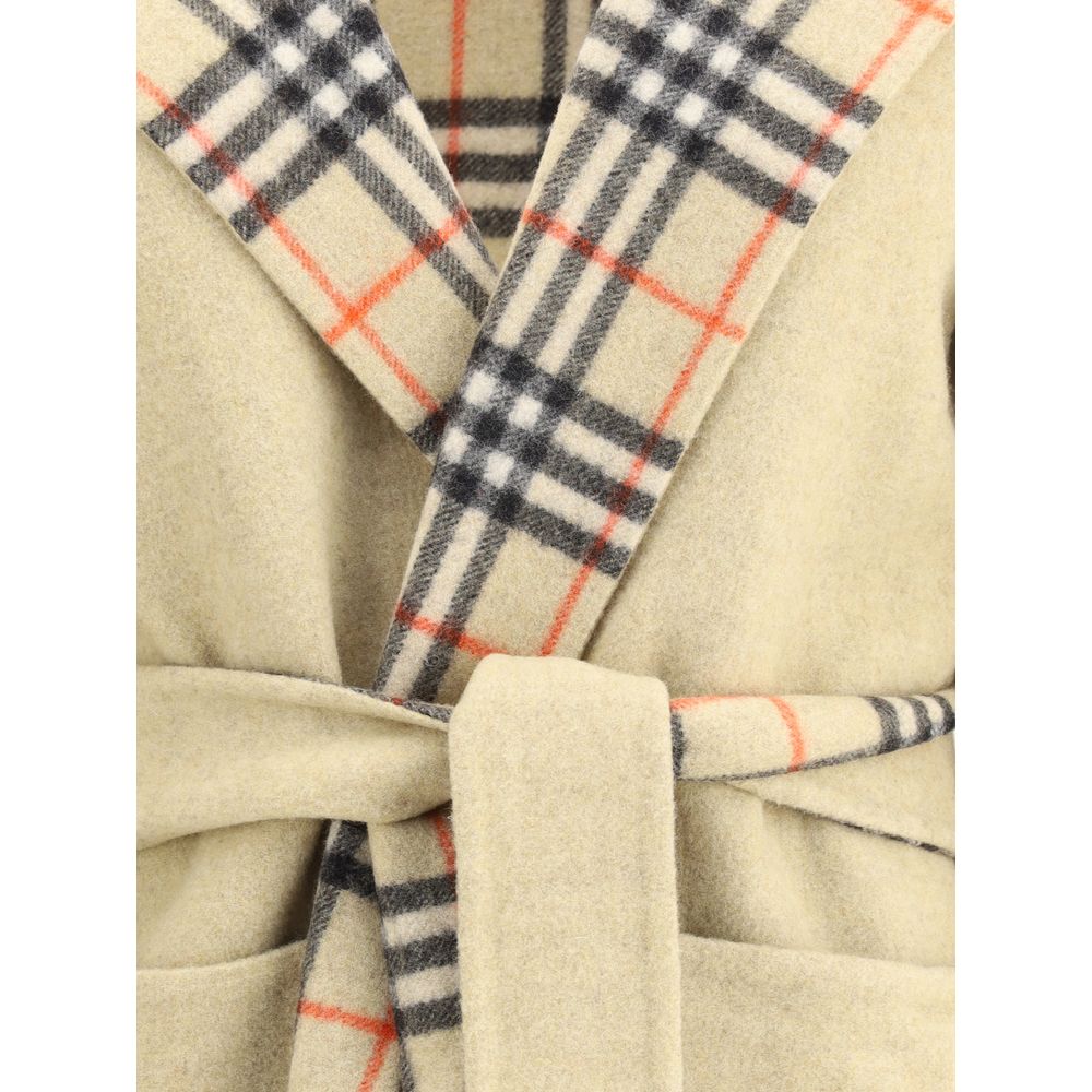 Close-up of Burberry Beige Wool Coat featuring reversible design with iconic Burberry Check pattern and detachable belt.