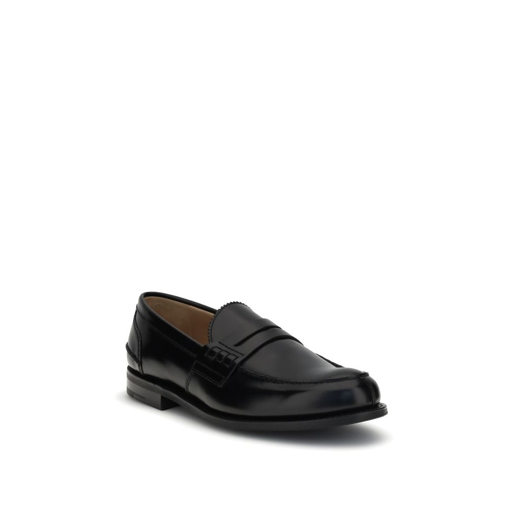 Church's Black Calf Leather Bos Taurus Slip-On Loafers with smoked finish and serged welt. Crafted for style and comfort, AW25 collection.