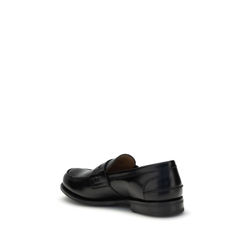 Side view of Church's Black Calf Leather Bos Taurus Slip-On Loafers showcasing refined college style and craftsmanship.