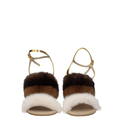 Fendi Brown Mink Strap-On Sandals with vintage effect, open toe, high heel, and side logo; made of mink and snake leather with buckle closure.