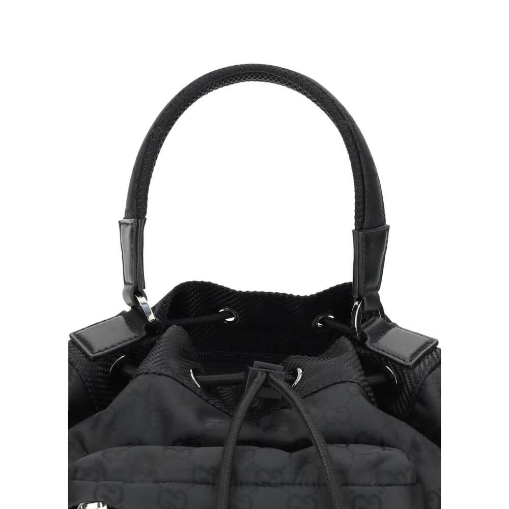 Gucci Black Polyamide Backet Bag with drawstring closure and iconic GG Supreme pattern detail.