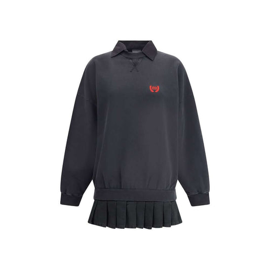 Balenciaga Black Cotton Casual Dress with embroidered logo and pleated skirt, showcasing a ribbed crew neck and cuffs.