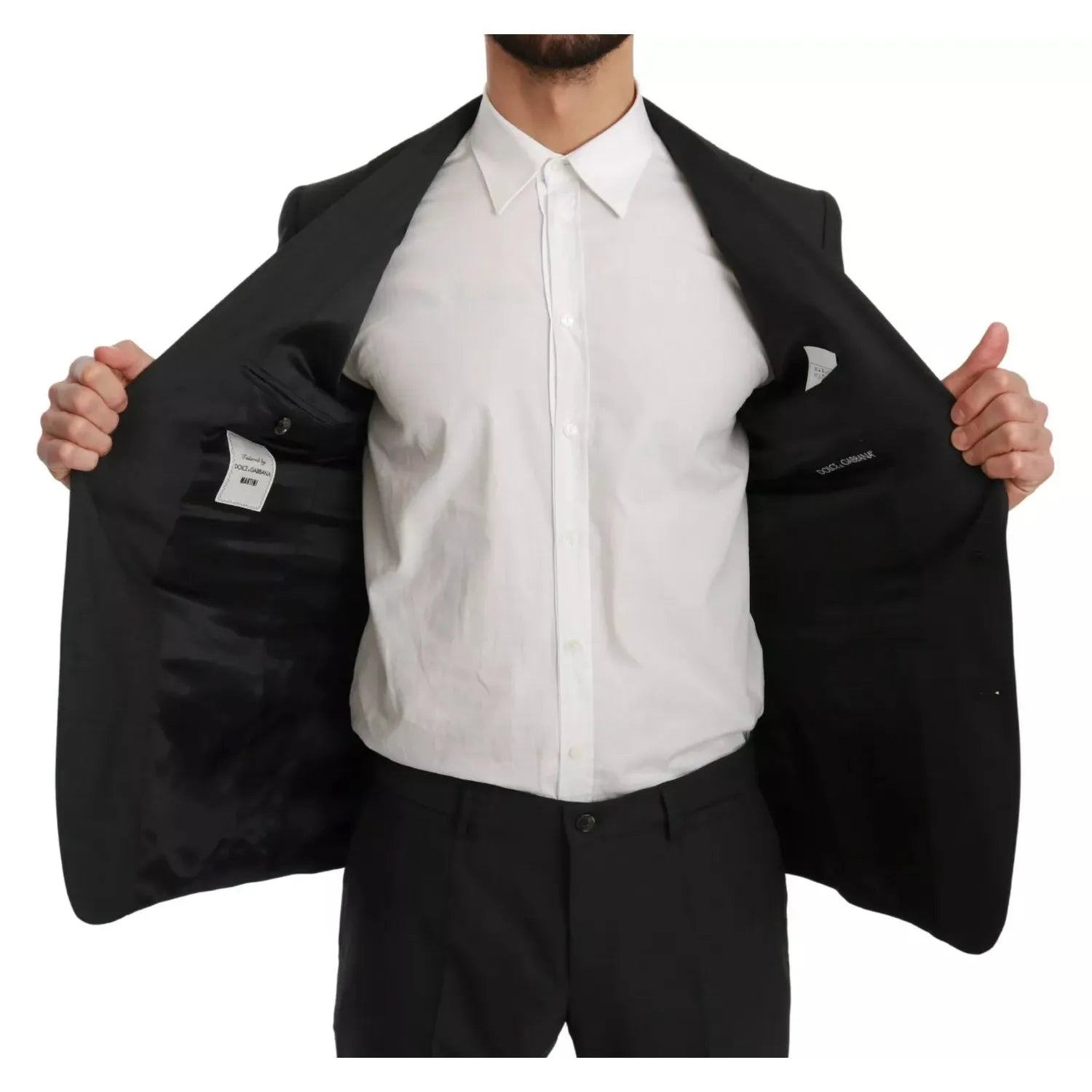 Front view with bag zipped and handles upright.