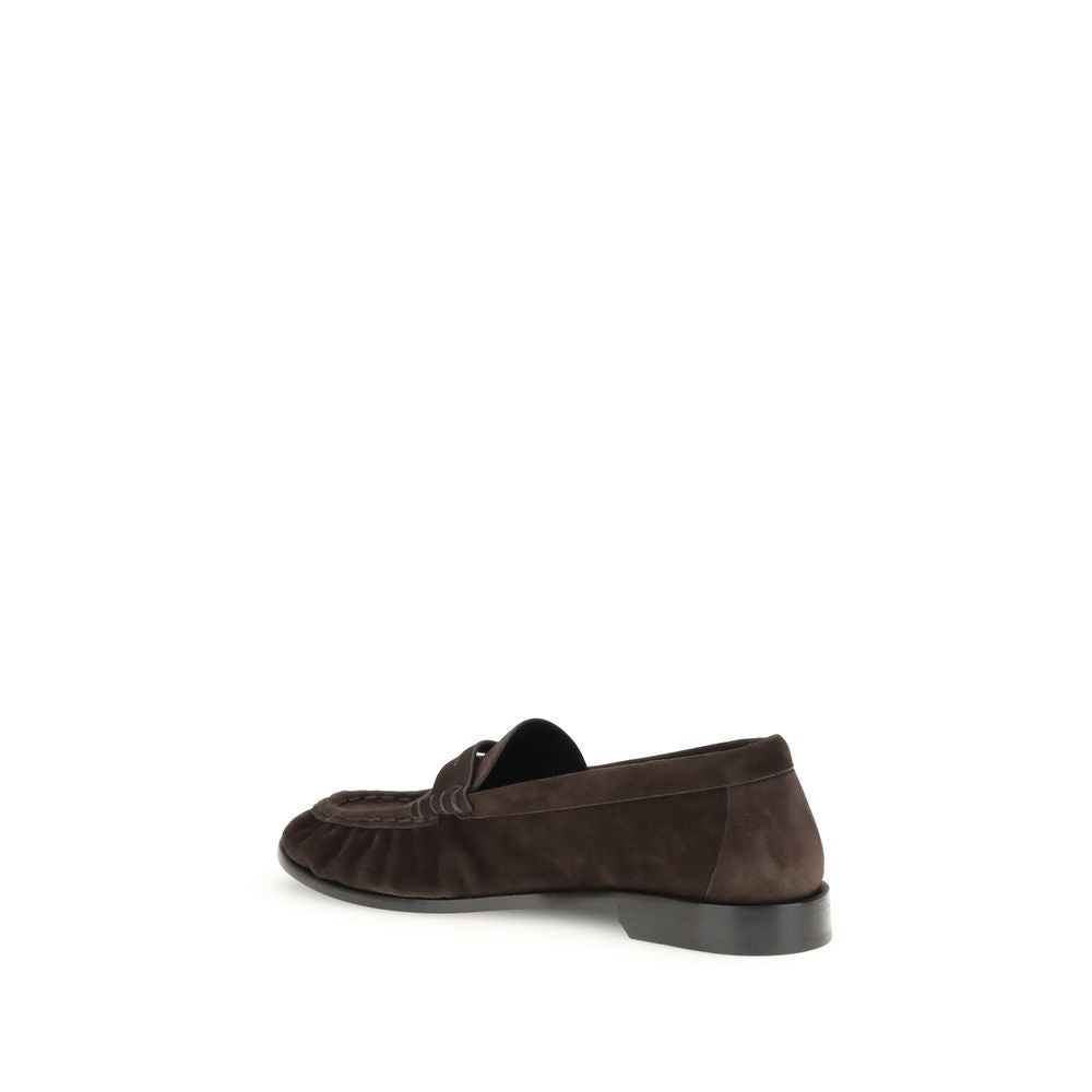 Saint Laurent Brown Calf Leather Bos Taurus Slip-On Loafers with gold Cassandre detail and moc toe, side view.