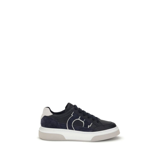 Ferragamo Blue Calf Leather Bos Taurus Low Top Sneakers with Gancini silhouette and textured rubber sole.