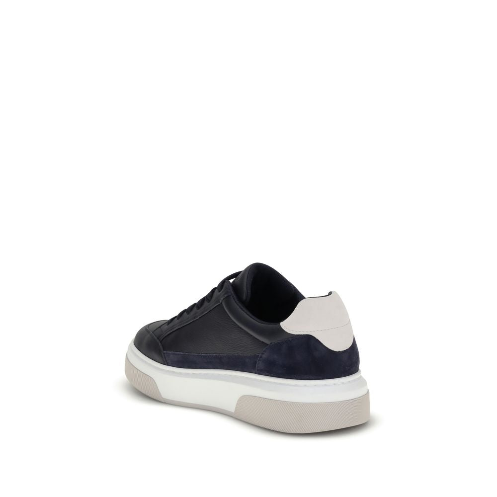 Ferragamo Blue Calf Leather Bos Taurus Low Top Sneakers with Gancini silhouette and suede inserts on a versatile rubber sole.