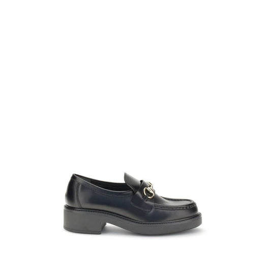 Gucci Black Calf Leather Bos Taurus Slip-On Loafers with iconic horsebit detail and block heel, perfect for formal or everyday wear.