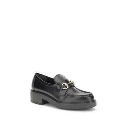 Gucci Black Calf Leather Bos Taurus Slip-On Loafers with horsebit detail, round toe, and block heel for a sophisticated look.