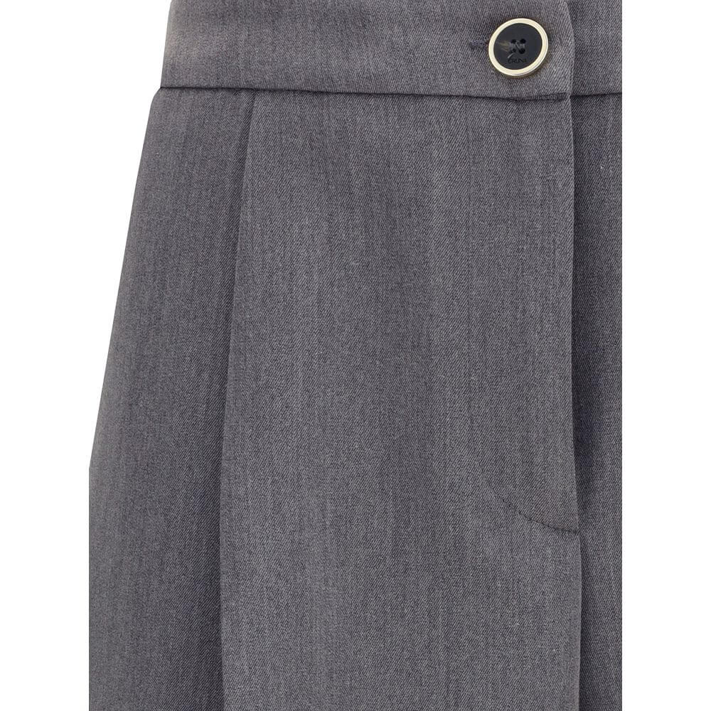 Close-up of Cruna Gray Polyester Casual Pants with button detail and slash pocket.