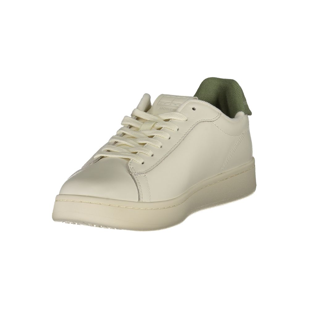 Tommy Hilfiger White Leather Men Sneaker with bold green detail and logo, offering iconic style and removable footbed for comfort.