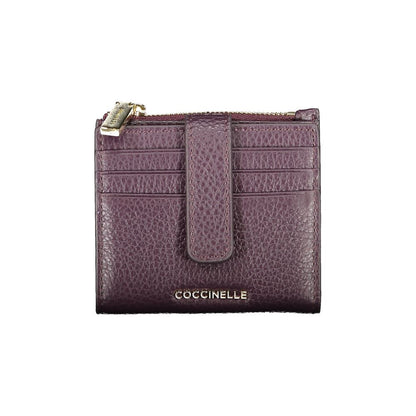 Coccinelle Purple Leather Women Wallet with embossed logo, triple card space, and secure storage, showcasing elegant purple leather design.
