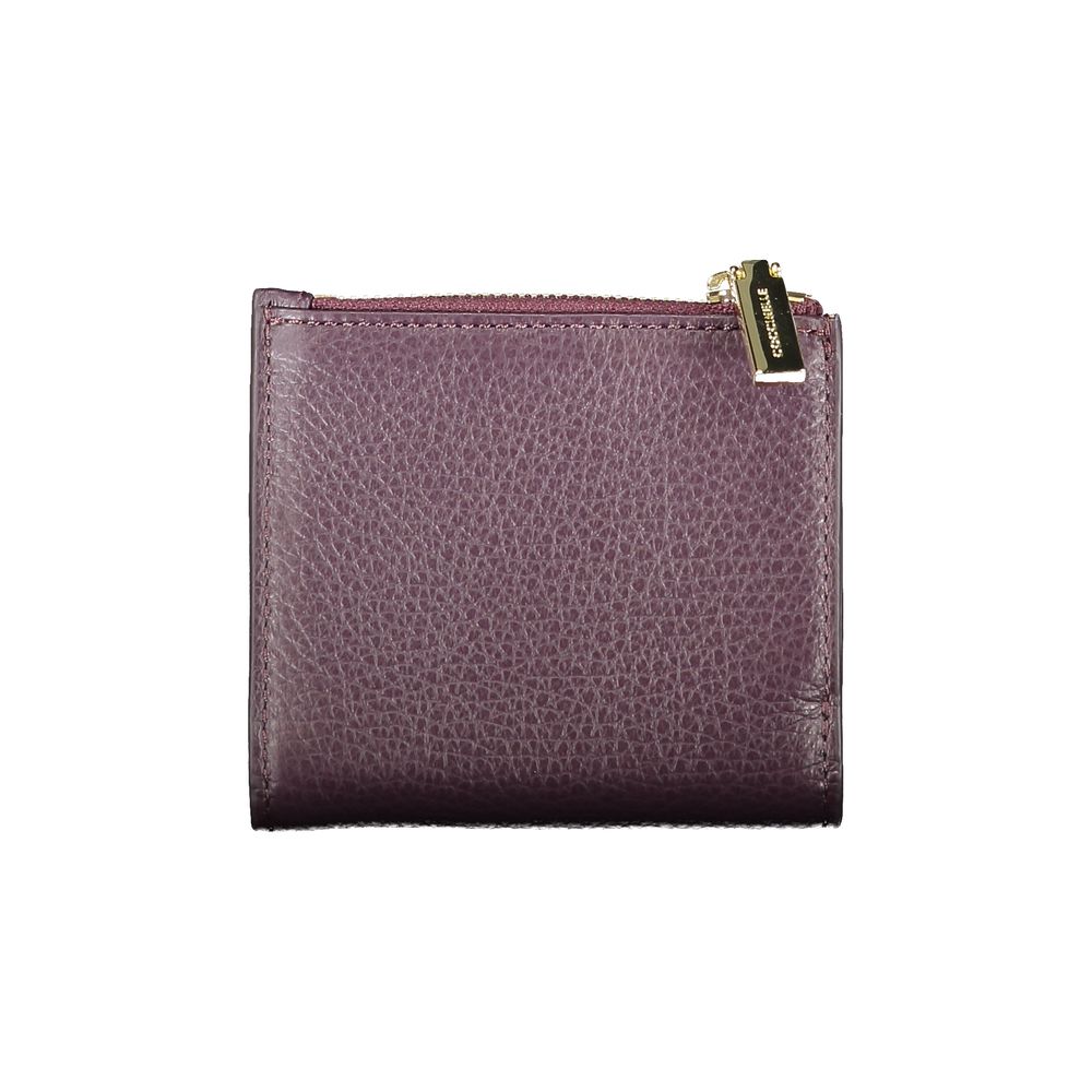 Front view of Coccinelle Purple Leather Women Wallet showcasing elegant design with embossed logo, ideal for style and functionality.