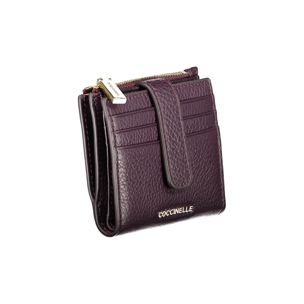 Coccinelle Purple Leather Women Wallet with embossed logo, triple card slots, and secure zipper, exuding elegance and functionality.