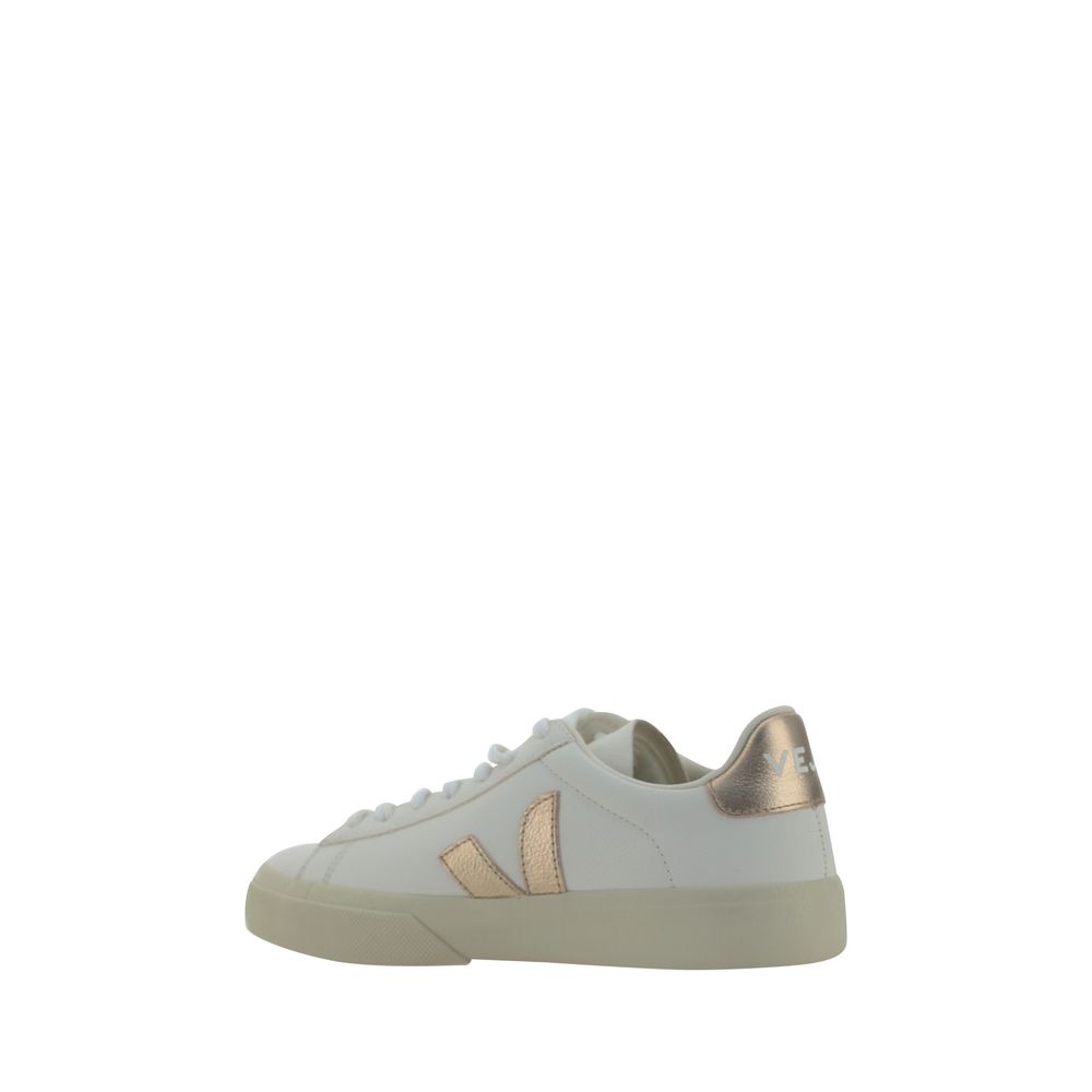 Veja White Calf Leather Bos Taurus Low Top Sneakers with round toe and contrast panels, side logo, lace-up front, and rubber sole.