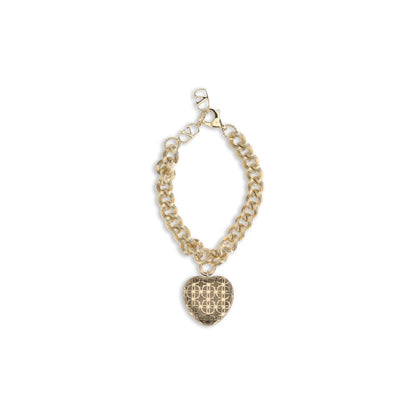 Valentino Garavani Gold Brass Bracelet with heart charm and VLogo, featuring gold-plated chain and swivel lobster clasp for secure wear.