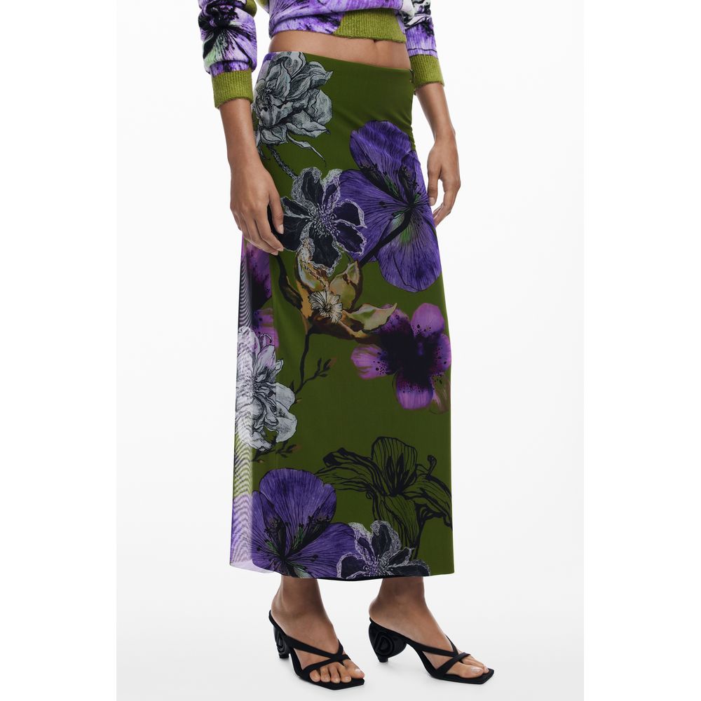 Woman wearing a Desigual Green Polyester Women Skirt with purple floral design and elasticated waist, showcasing whimsical tulle flowers.
