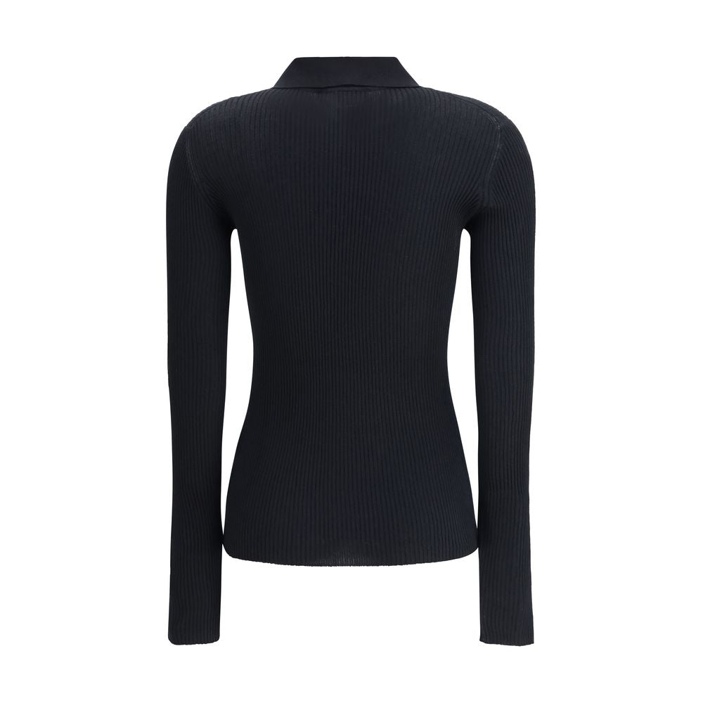 Dolce & Gabbana Black Cashmere Polo Shirt with long sleeves and ribbed design, showing back view. Ideal for elegant and casual looks.