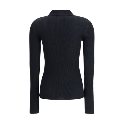 Dolce & Gabbana Black Cashmere Polo Shirt with long sleeves and ribbed design, showing back view. Ideal for elegant and casual looks.