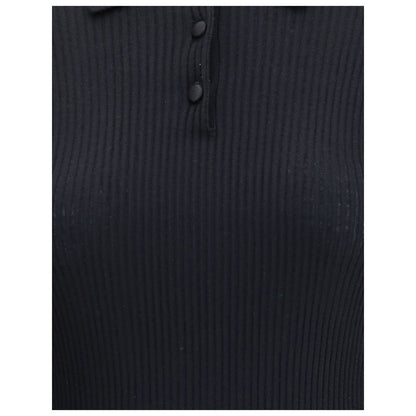 Dolce & Gabbana Black Cashmere Polo Shirt with ribbed design and three-button closure, ideal for both casual and sophisticated looks.