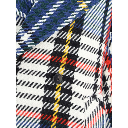 Close-up of Sara Roka Multicolor Wool Coat fabric, featuring check pattern with bold colors, highlighting texture and button detail.