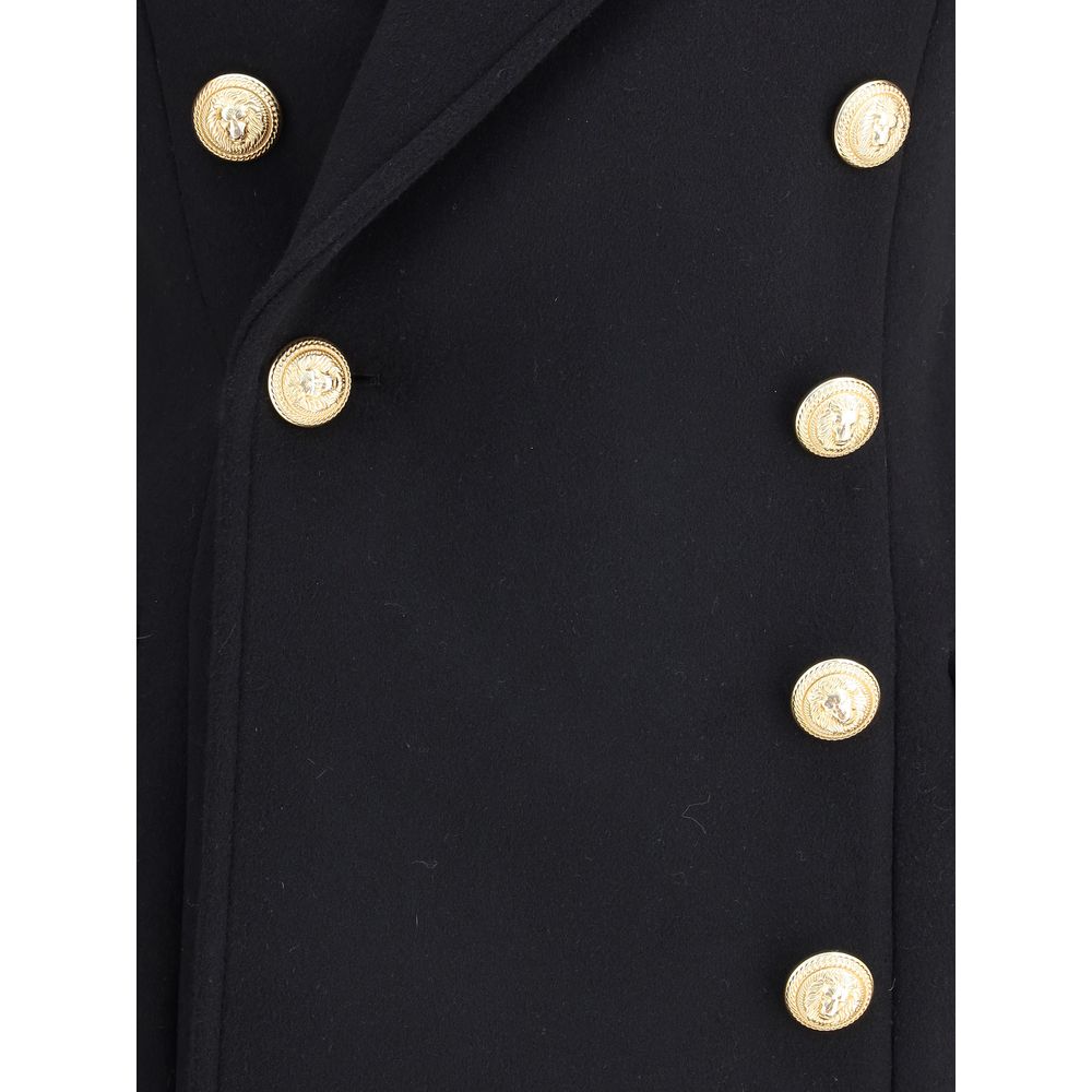 Close-up of Balmain Black Fleece Wool Coat with gold metal 'Lion Chain' buttons highlighting the elegance and luxury.