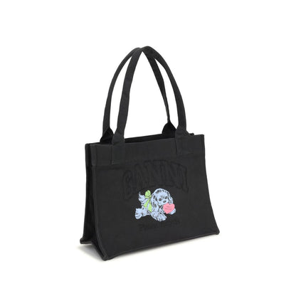 Ganni Black Cotton Shoulder Bag with puppy graphics and embroidered logo, featuring top handles and spacious compartment for essentials.