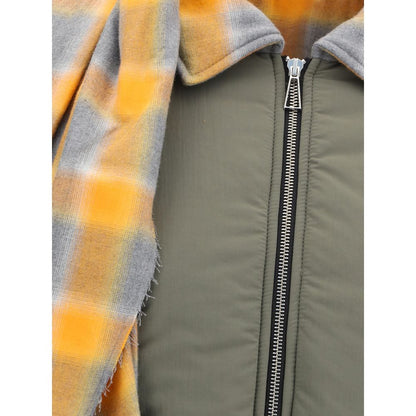 Close-up of MARBELL Green Cotton Coat with plaid scarf detail and front zip closure, made from quilted down polyester, season AW25.