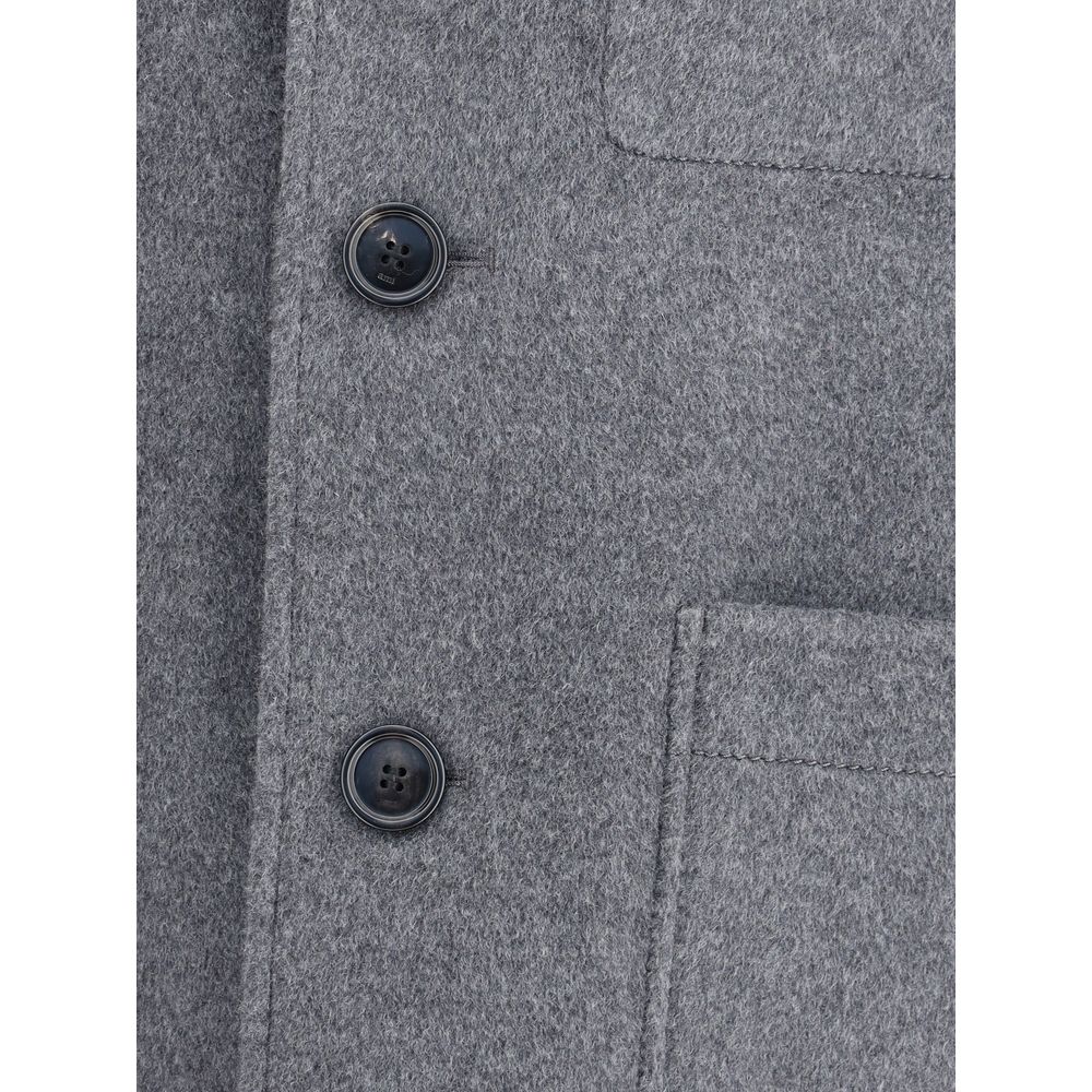 Close-up of the Ami Paris Gray Wool Coat showing buttons and patch pocket detail, made of 90% wool and 10% cashmere.