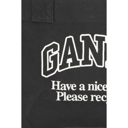 Close-up of Ganni Black Cotton Shoulder Bag with logo and recycling message