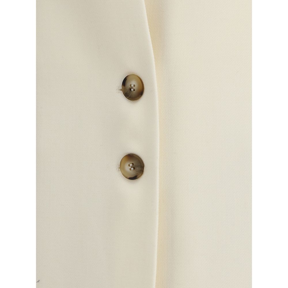 Close-up of button details on Di Stavnitser White Fleece Wool Coat with elegant, structured design and fine craftsmanship.