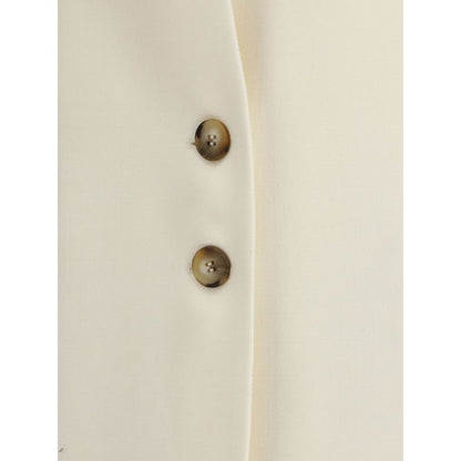 Close-up of button details on Di Stavnitser White Fleece Wool Coat with elegant, structured design and fine craftsmanship.