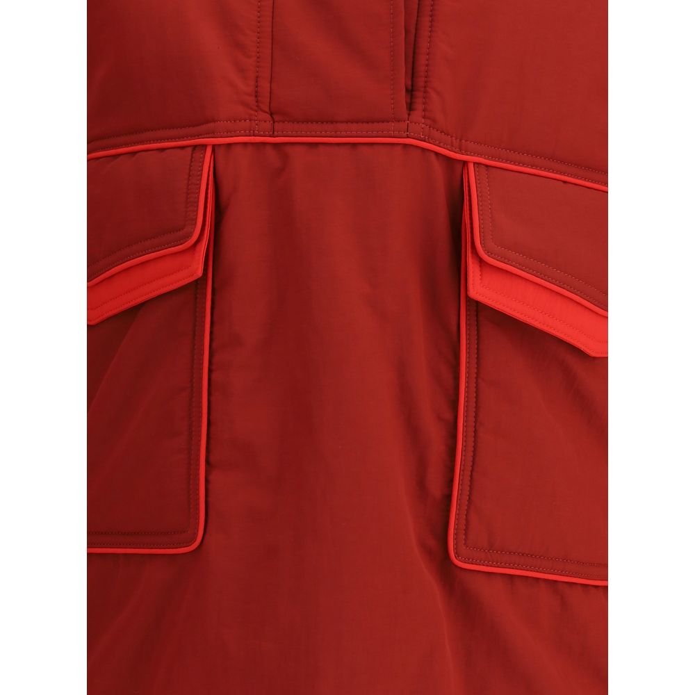 Close-up of MARBELL Red Polyamide Shell Jacket featuring front pockets and detailed stitching, highlighting the vibrant red color and texture.