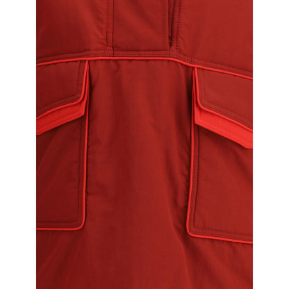 Close-up of MARBELL Red Polyamide Shell Jacket featuring front pockets and detailed stitching, highlighting the vibrant red color and texture.