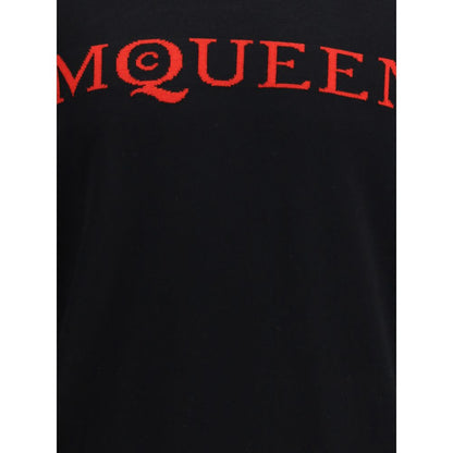 Close-up of Alexander McQueen Black Wool Sweatshirt displaying iconic red brand signature embroidery.