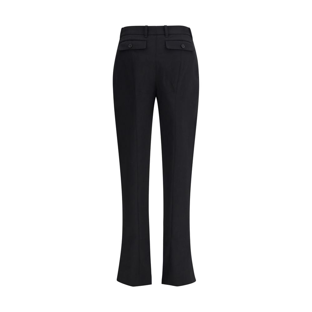 Alexander McQueen Black Wool Dress Pants with tapered straight leg and flap back pockets.