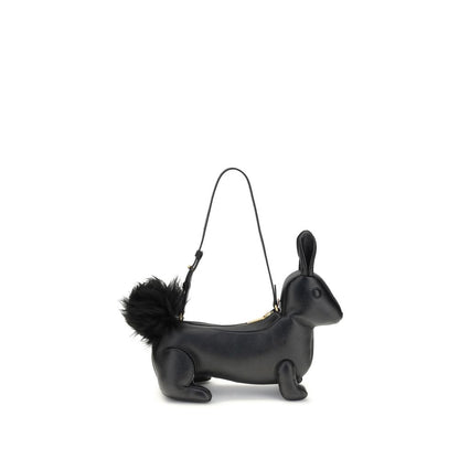 Thom Browne Black Calf Leather Bos Taurus Shoulder Bag shaped as a rabbit with fur tail and brass zipper closure.