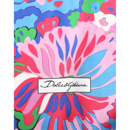 Dolce & Gabbana Multicolor Floral Print Silk Blouse Tunic Top fabric with vibrant floral design.