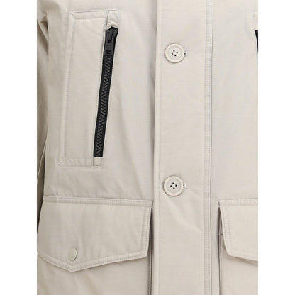 Close-up of Woolrich Beige Cotton Parka with front zipper, buttons, and pockets, highlighting the high-necked design and seasonal style.