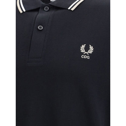 Comme Des Garçons Black Cotton Polo Shirt with CDG logo and white collar trim, featuring a regular fit and modern design elements.