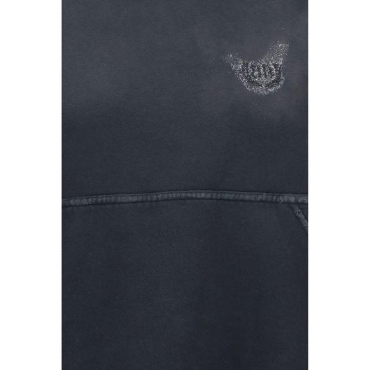 Balenciaga Cropped HoodieBalenciaga’s Cropped Hoodie interprets streetwear with a bold and intentionally lived-in aesthetic. Featuring dropped shoulders and a front pouch pocket, it features a short silhouette with gathered cuffs and waist for an unstruct