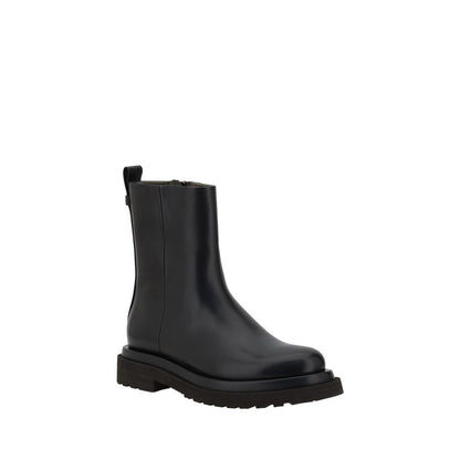 Brunello Cucinelli Black Calf Leather Bos Taurus Ankle Boots with block heel and round toe for comfort and style
